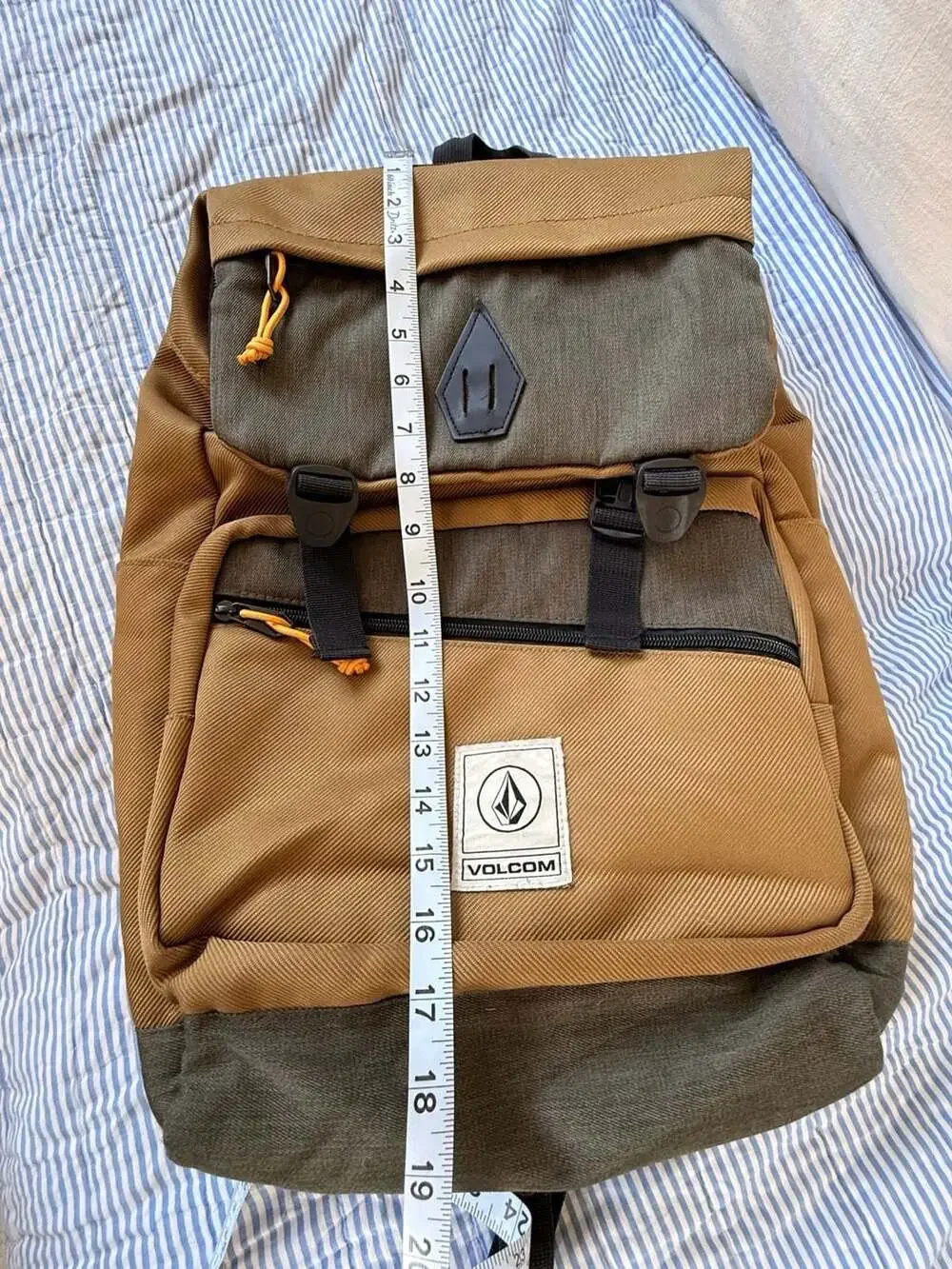 Volcom Brown and Green Flap Backpack with Buckle Straps excellent condition.